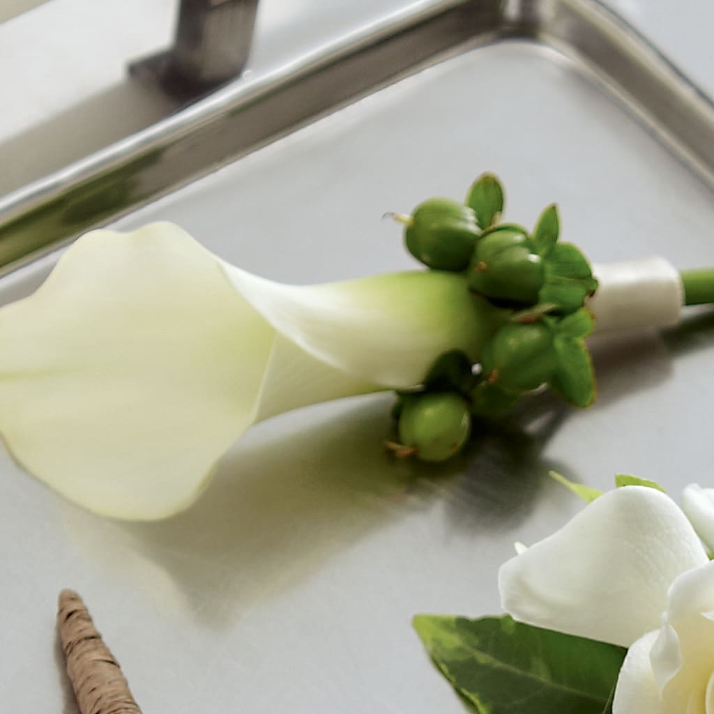 White Calla Boutonniere – Brownsville Premiere Florist, Brooklyn NY